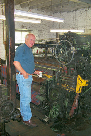 Picture of a man standing in a woollen mill
