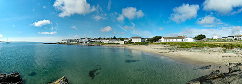 Picture of a panoramic view over a coastal village (Port Charlotte on the Isle of Islay)