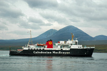 Picture of a ferry (Isle of Arran) in the Sound of Islay, the Paps of Jura in the background