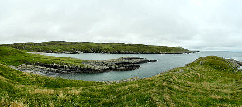 Picture of a panoramic view over a long bay (Kilchiaran Bay on Islay)