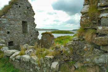 Picture of a view over ruins looking out to a small island (Finlaggan)