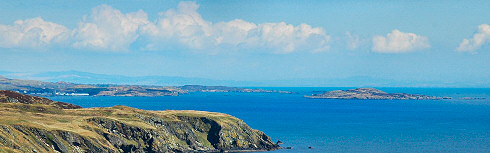 Picture of a panoramic view over a smaller island next to a large island