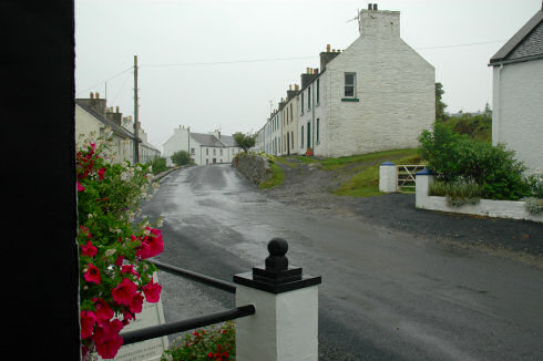 Picture of Main Street in Port Charlotte, Islay, on a rainy day