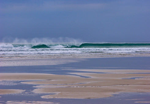 Picture of a wave breaking when approaching a beach (Machir Bay, Islay)