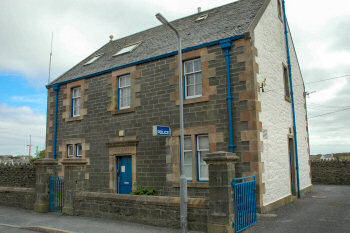 Picture of a police station in an old building (Port Ellen police station on Islay)