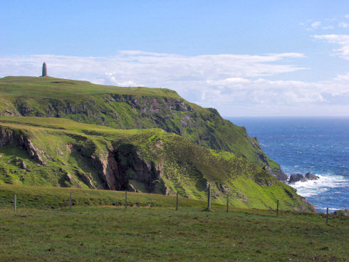 Picture of the American Monument (a brick built structure) on The Oa (high cliffs above the sea)