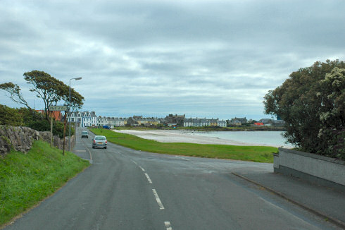 Picture of a road leading into a coastal village