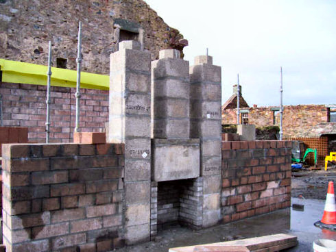 Picture of a fireplace under construction