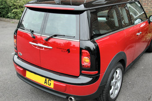 Picture of a Mini Clubman from the back, Islay sticker just visible