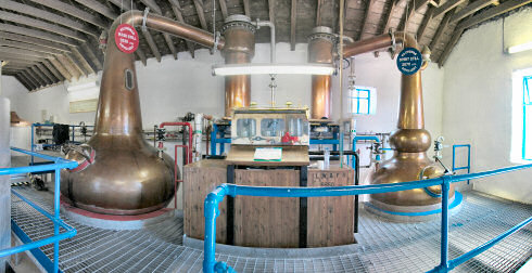 Picture of a panorama of the still house of a farm distillery (Kilchoman distillery on Islay)