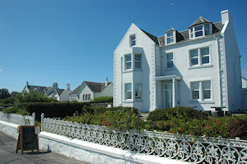 Picture of the an taigh-osda hotel on Islay in bright July light