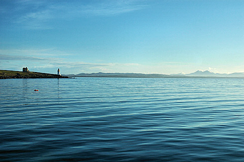 Picture of a sunny calm April morning at a sea loch, Loch Indaal on the Isle of Islay
