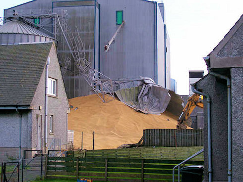 Picture of a collapsed grain silo at an industrial maltings