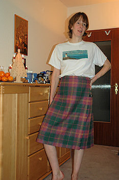 Picture of a woman in an Discover Islay tartan kilt skirt