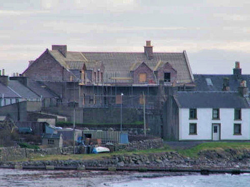 A closer look at the hotel, the new chimneys can be easily identified from this direction as well. Picture of an under construction hotel