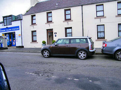 Picture of a Mini Clubman parked in a village road