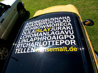 Picture of the roof of a car with the names of all Islay distilleries printed on it