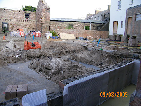 Picture of the foundation for an extension at a hotel