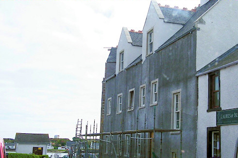 Picture of a hotel under construction, scaffolding just removed