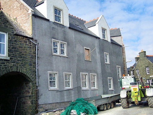 Picture of a hotel under construction, scaffolding just removed