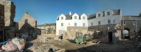 Panoramic picture of the back of an under construction hotel