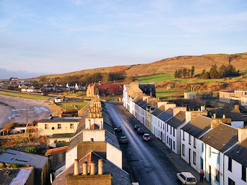Picture of a view down a village road from a high vantage point