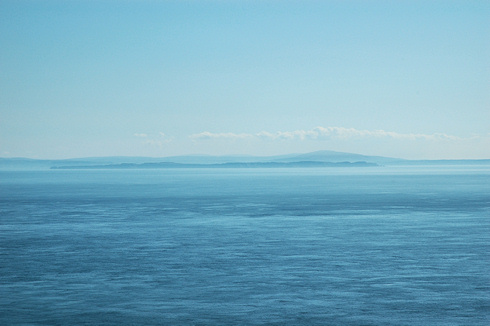 Picture of a coastline seen across a channel