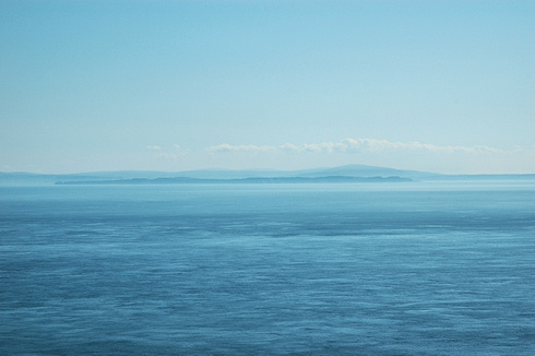 Picture of a coastline seen across a channel