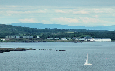 Picture of Laphroaig distillery on Islay seen from a hill in the distance