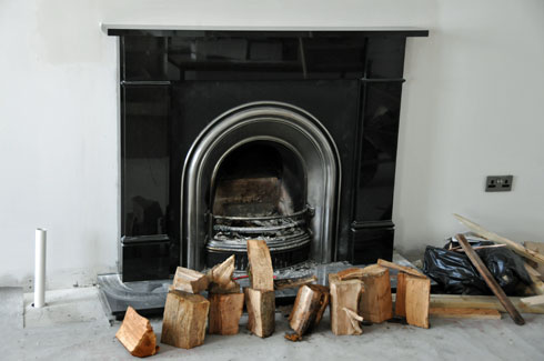 Picture of a fireplace in an under construction room