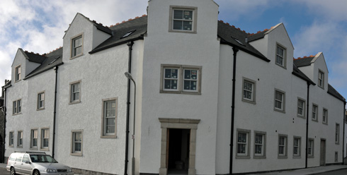 Panoramic picture of the Islay Hotel front in Port Ellen