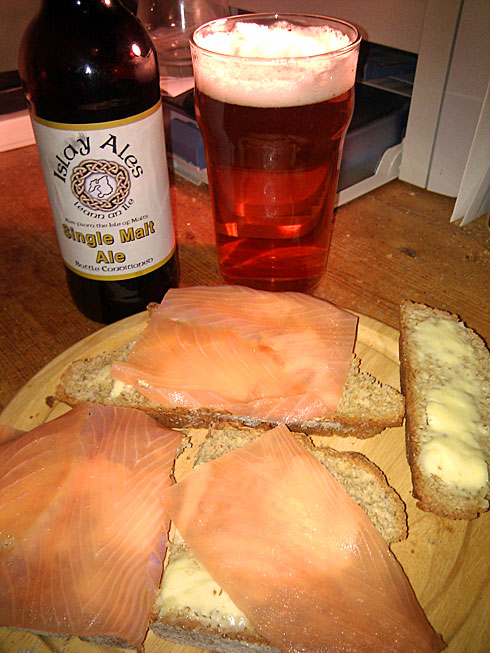 Picture of a soda bread served with smoked salmon and a pint of Islay Ale