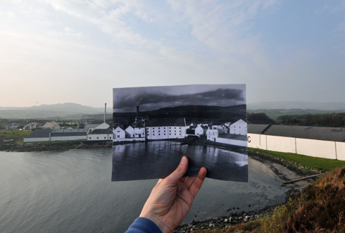 Picture of an old picture inside a current picture of Laphroaig distillery