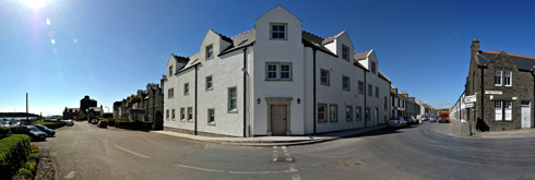 Picture of a panoramic view of the under construction Islay Hotel in Port Ellen