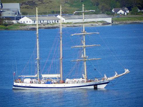 The Pogoria with the Port Ellen distillery warehouses in the background Picture of the tall ship Pogoria