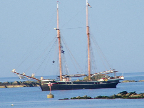 A tall ship anchored further out Picture of an unknown tall ship