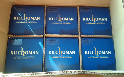 Picture of a box of six bottles of Kilchoman Islay single malt whisky