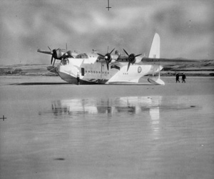 Old picture of a short Sunderland Mark II on the beach in Laggan Bay, Islay