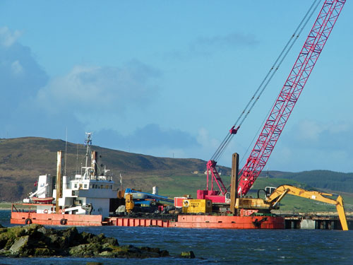 Picture of a dredger at work near Port Ellen pier on Islay