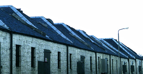 Picture of old distillery warehouses with storm damage