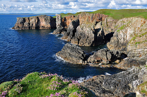 Picture of cliffs with a sea stack among them