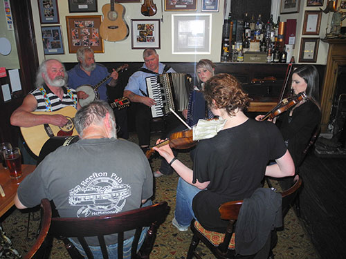 Picture of a group of musicians playing traditional Scottish music
