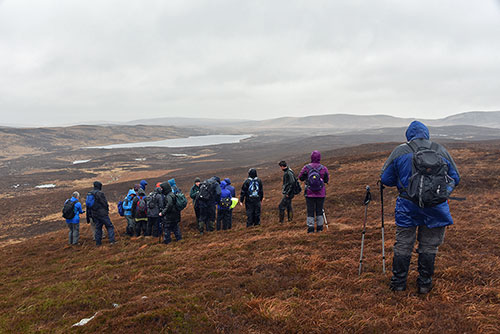 Picture of a group of wet walkers in the rain